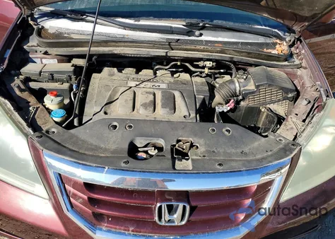 2010 Honda Odyssey Exl z USA, uszkodzony, nr VIN 5FNRL3H75AB070047